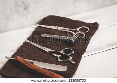 Mens hairdressing wooden desktop with tools