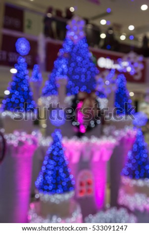 Christmas scene with deco gifts in blur for background use , Abstract take of colorful Christmas tree and light as a background, a background