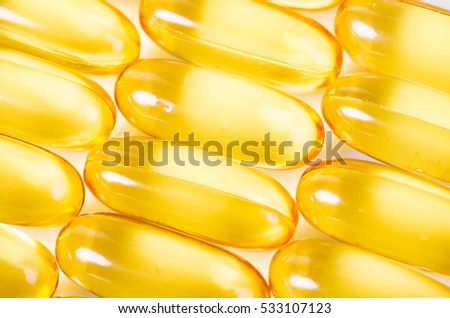 Close up Fish Oil texture on white background, Top view.