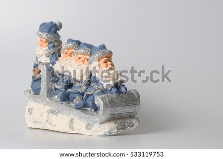 Santas on a sled