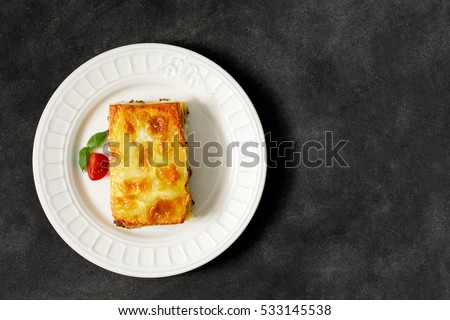 Traditional Italian lasagna made with minced beef. Horizontal orientation Royalty-Free Stock Photo #533145538