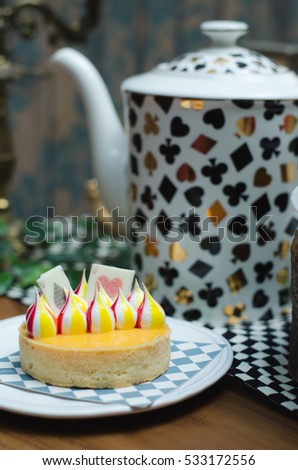Lemon tart, colorful White Chocolate stripes on lemon tart.((Alice in wonderland Theme))