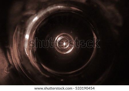 Abstract dark brown technical background or glass eye 