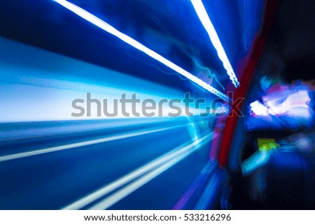 Abstract background from blurred moving car light in tunnel