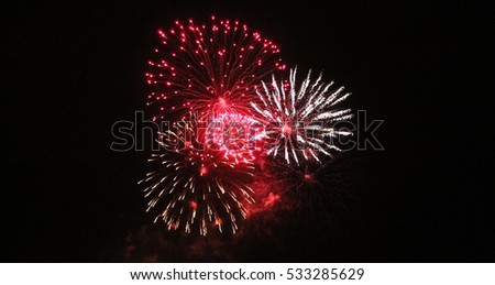 Fireworks light up the sky with dazzling display celebration  New years eve congratulations event  stock, photo, photograph, picture, image