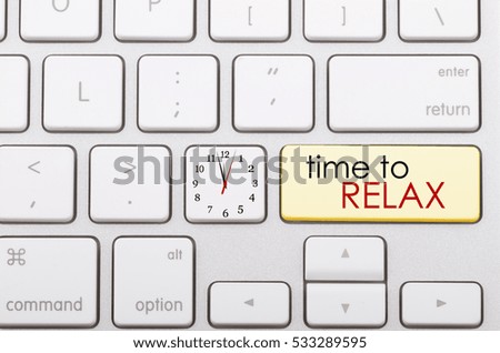 Time to relax word written on computer keyboard.