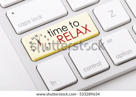 Time to relax word written on computer keyboard.