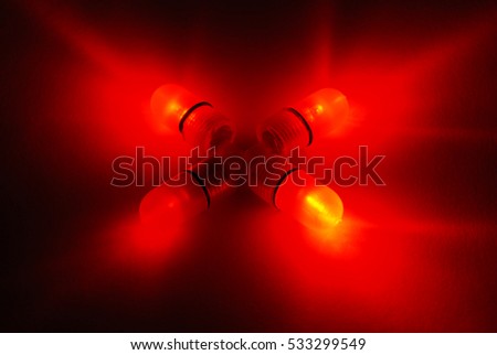 Fishing four red LED power indicators isolated on black background