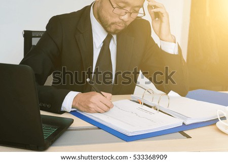 Business man signing a contract