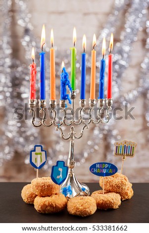 Jewish holiday Image of jewish holiday Hanukkah background with menorah traditional candelabra and burning candles