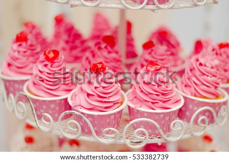 cute and colorful yummy cupcake tier