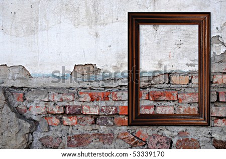 wooden frame over grunge brick wall background