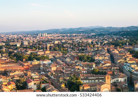 travel to Italy - above view of residential area in Bologna city from Torre Asinelli ( Asinelli Tower) at sunset
