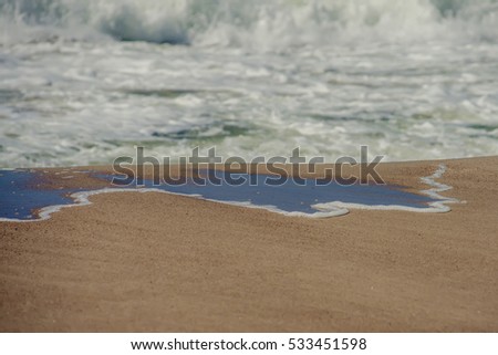 Waves on the shore of the Baltic Sea on a clear sunny summer day