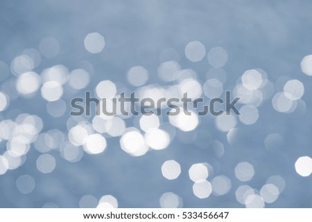 The Defocused Of Water surface with waves glittering in the sun.