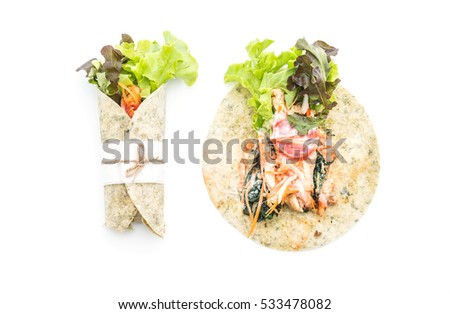 wrap salad roll with chicken and spinach on white background