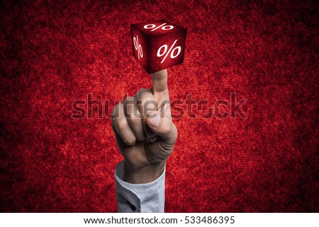 red cube on hand