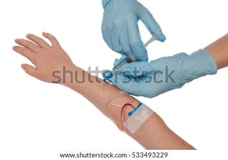 Hands with medical gloves, syringe stabs hand
Nurse giving a vaccine for a patient