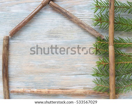 Wooden silhouette and natural material texture of eco house.