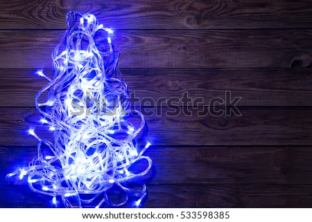 Christmas garland shining blue color