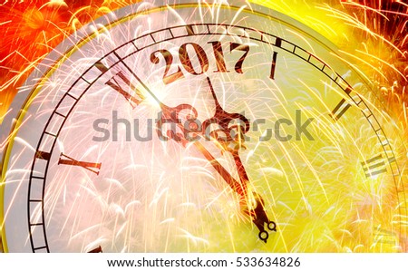 2017 New year clock counting down and sparkler