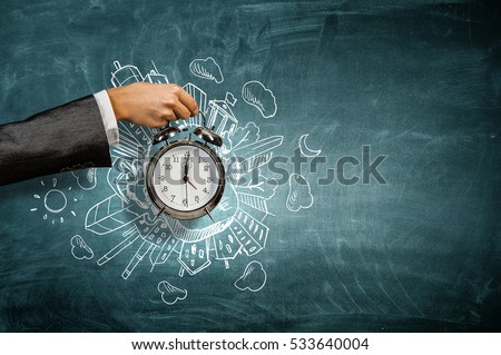 Time management concept . Mixed media Royalty-Free Stock Photo #533640004