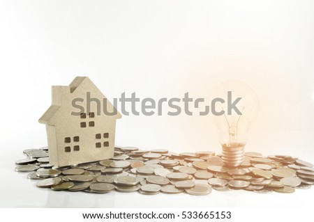 Mortgage loading and property document concept for real estate. Bulbs for lamps - idea Home finances, building savings and realty financing (investments) concept.