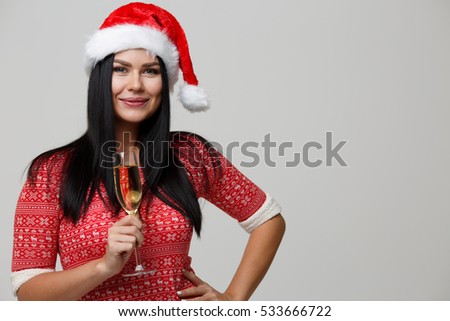 Beautiful brunette in Christmas cap