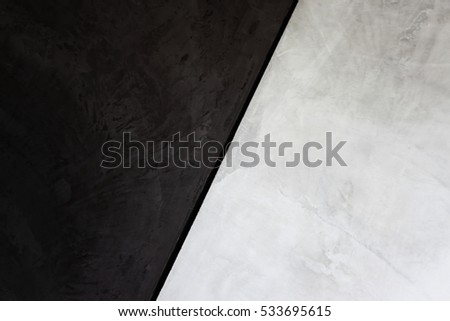 Bare cement vintage wall white and black,in dark tone wall.two tone wall. Royalty-Free Stock Photo #533695615