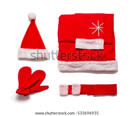 Santa Claus clothes isolated on white background.
Fur coat, hat, belt and mittens. Red Christmas colors