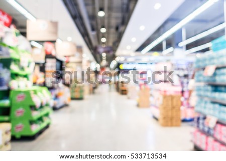 Abstract blur supermarket and shopping mall in retail sotre interior for background Royalty-Free Stock Photo #533713534