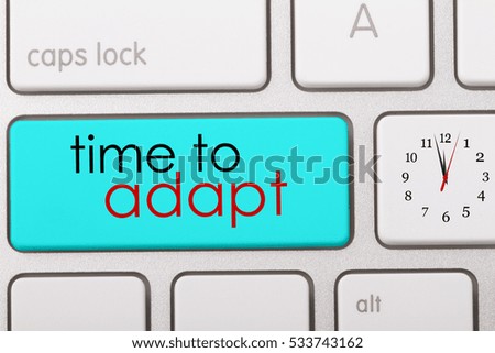 Time to adapt written on computer keyboard.