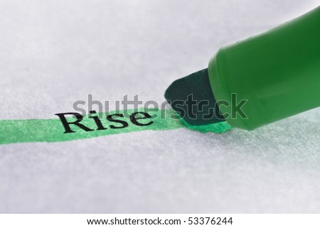 Highlighter and the word 'rise'- concept business background