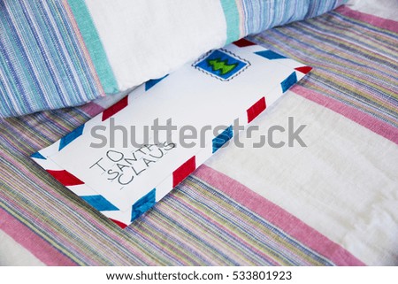 Letter to Santa Claus under the pillow