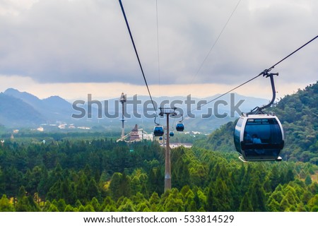The Sun Moon Lake Ropeway is a scenic gondola cable car service that connects Sun Moon Lake with the Formosa Aboriginal Culture Village theme park. Royalty-Free Stock Photo #533814529
