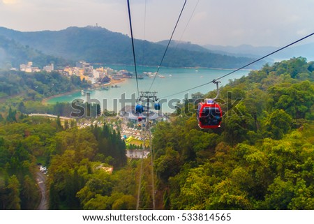 The Sun Moon Lake Ropeway is a scenic gondola cable car service that connects Sun Moon Lake with the Formosa Aboriginal Culture Village theme park. Royalty-Free Stock Photo #533814565