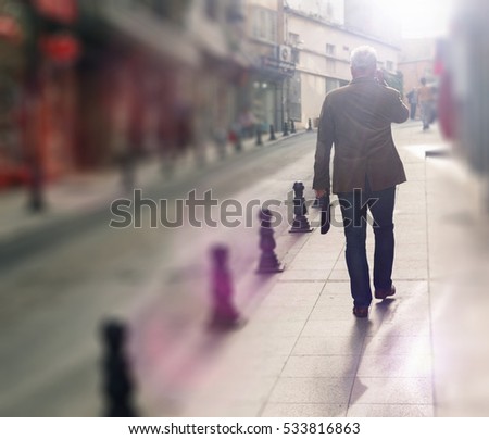 Man walks on the old town