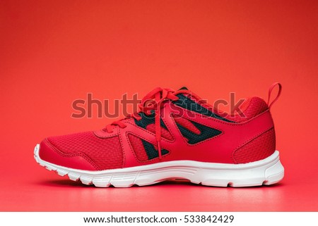Red sport running shoes