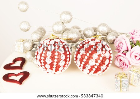 Red baubles ,hand made , christmas decorations ,white ,background, glitter ,many ,ornaments ,december ,winter ,celebration ,holidays ,heart ,silver ,season ,pink roses ,hearts