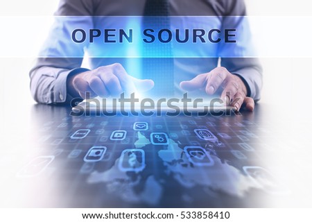 open source concept. Businessman working with modern tablet pc.