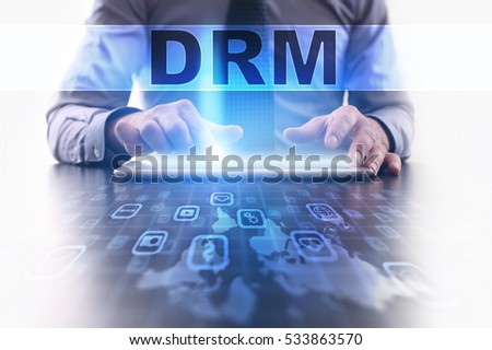 drm concept. Businessman working with modern tablet pc.