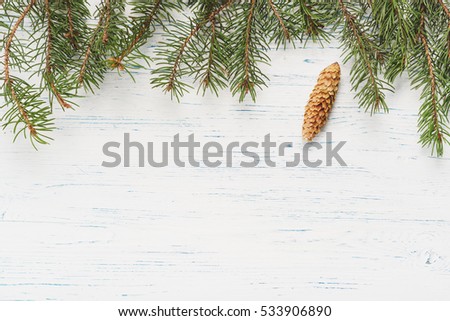 Christmas wooden background with fir branches, wooden background