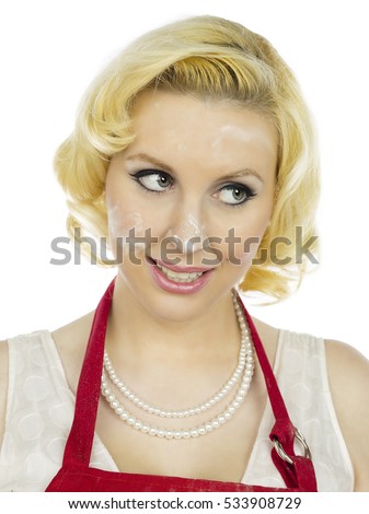 Blonde retro housewife baking - isolated on white background 