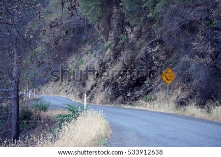 Secluded Road in Rock Slide Area of Mountains of California