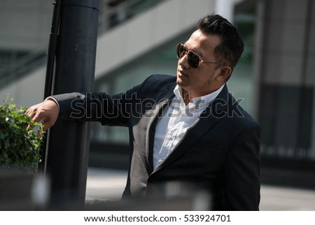 Asian man in business look.
