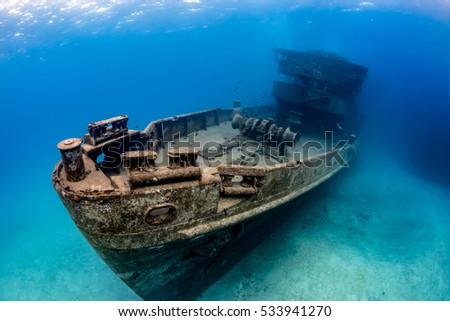 Underwater Wreck of the USS Kittiwake  - a large artificial reef in the Caribbean Royalty-Free Stock Photo #533941270