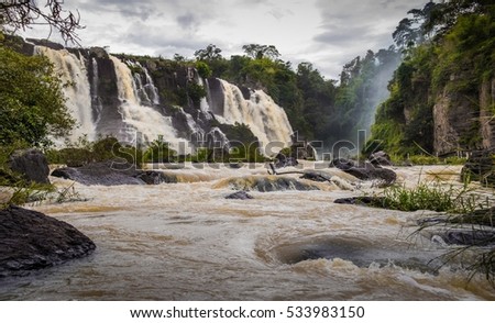 Nature landscape of waterfall in Vietnam. waterfall in mountain forest under great sky.Adventures and travel concept.Scenic landscape.beautiful place.wild nature.
