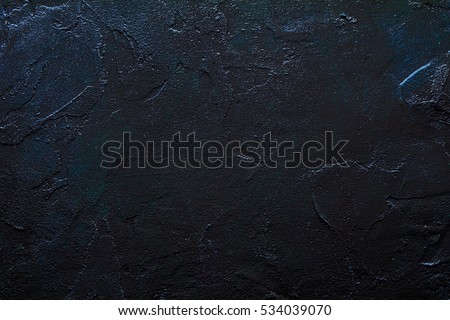 black stone surface with a glossy finish / background black stone Royalty-Free Stock Photo #534039070