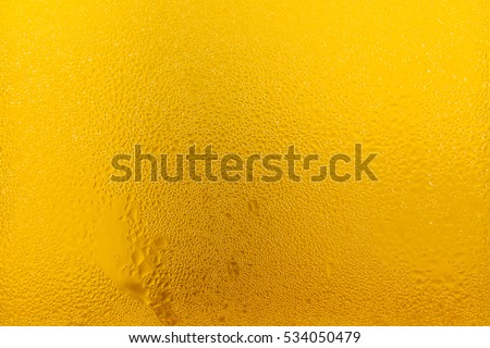 Droplets on freshly poured beer, droplets on freshly poured beer background and texture