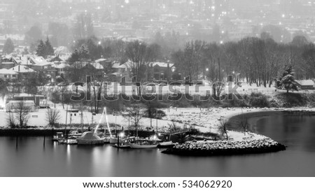 snow in the evening.English bay Vancouver BC Canada